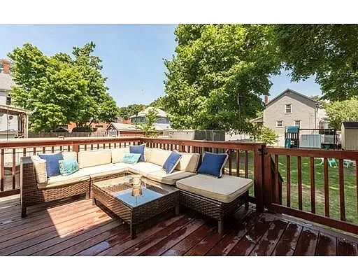 A deck with outdoor seating